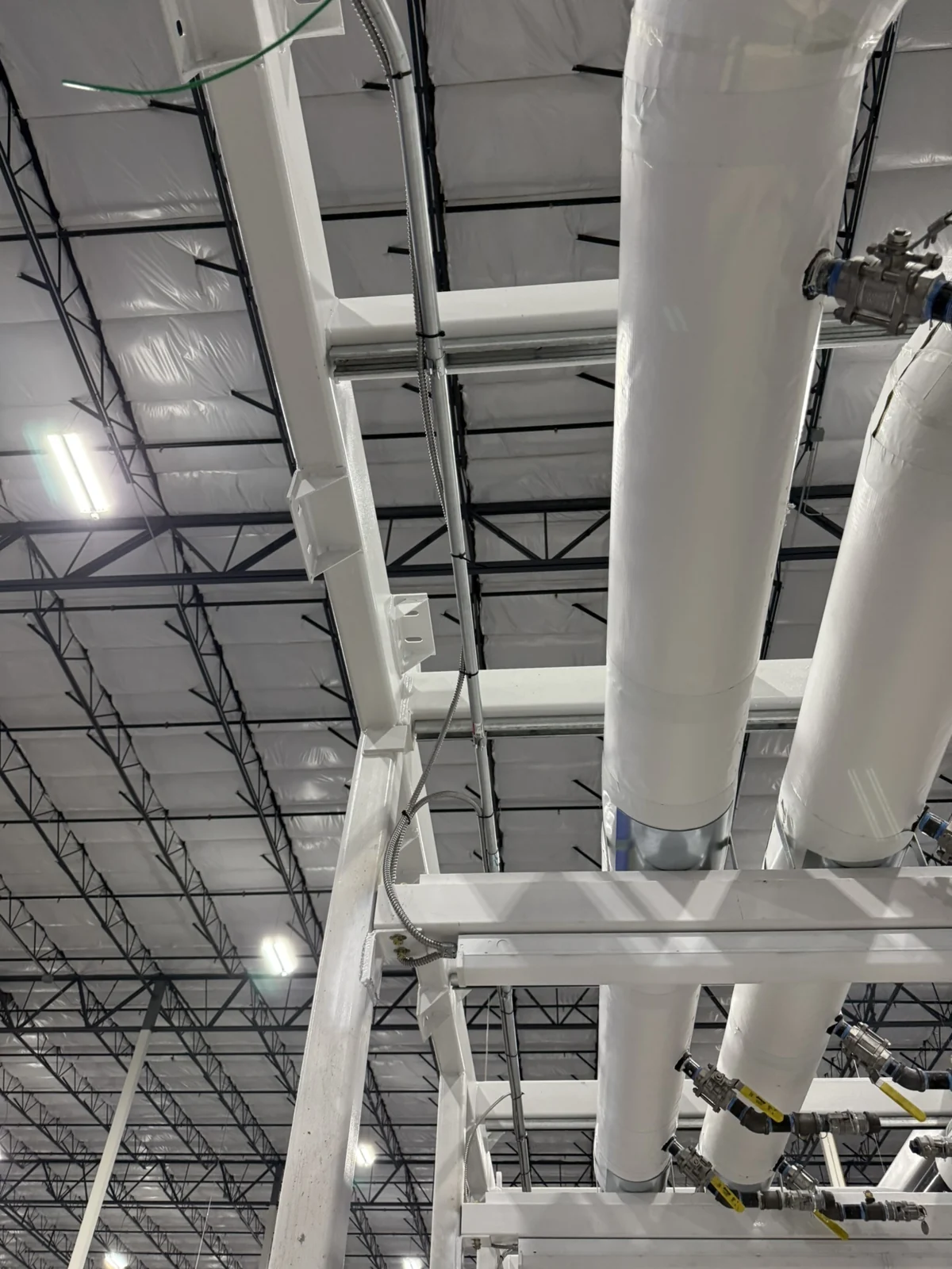 Overhead electrical infrastructure in a facility work area